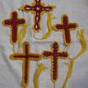 Hand crocheted crosses (bookmarks) by Roz Beard. Made in Red & Gold Marine Corps colors.