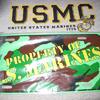 License Plate: Property of U.S. Marines. Donated by Dave Johnson.